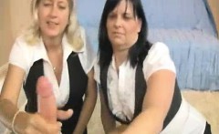 Two Milfs Jacking Off The Thick Cock