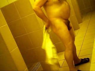 Naked men in public pool shower