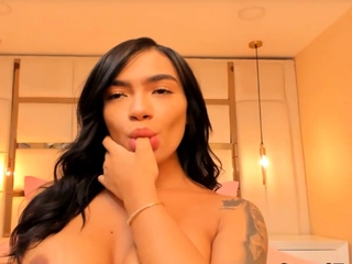 Curvey Latina sucks her toy in her bedroom